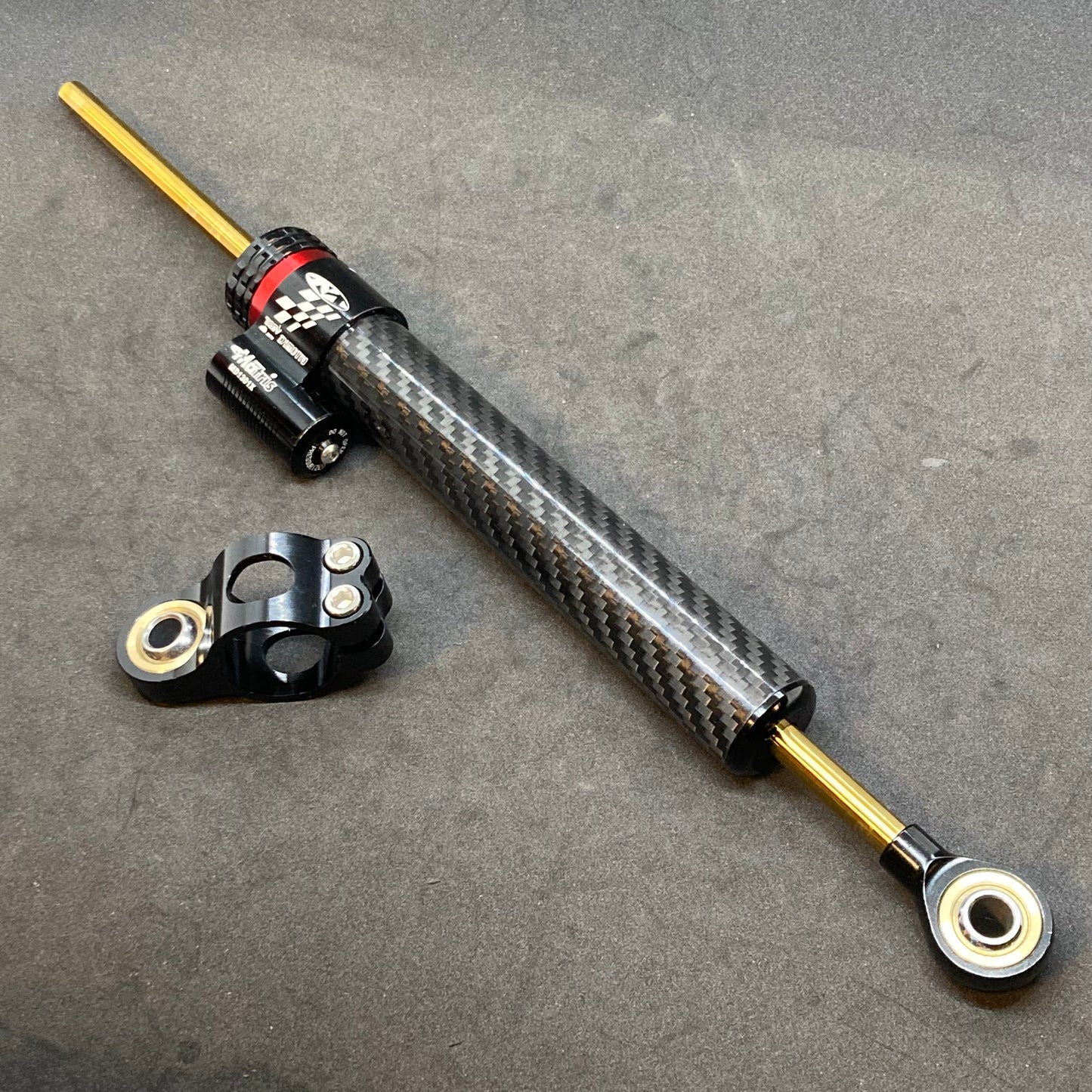 Steering damper (aftermarket, 2014+)