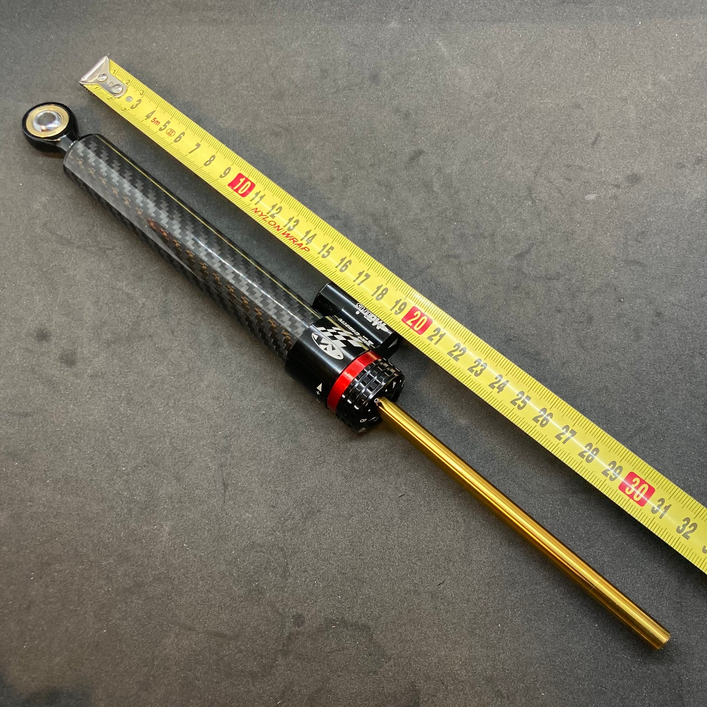 Steering damper (aftermarket, 2014+)
