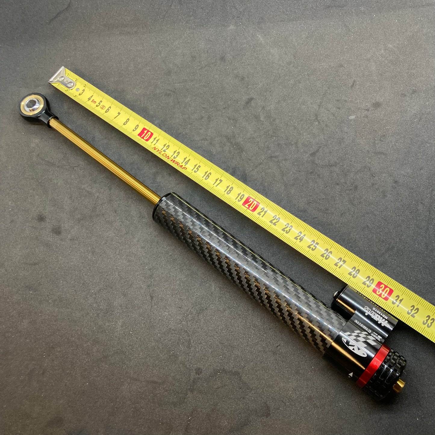 Steering damper (aftermarket, 2014+)