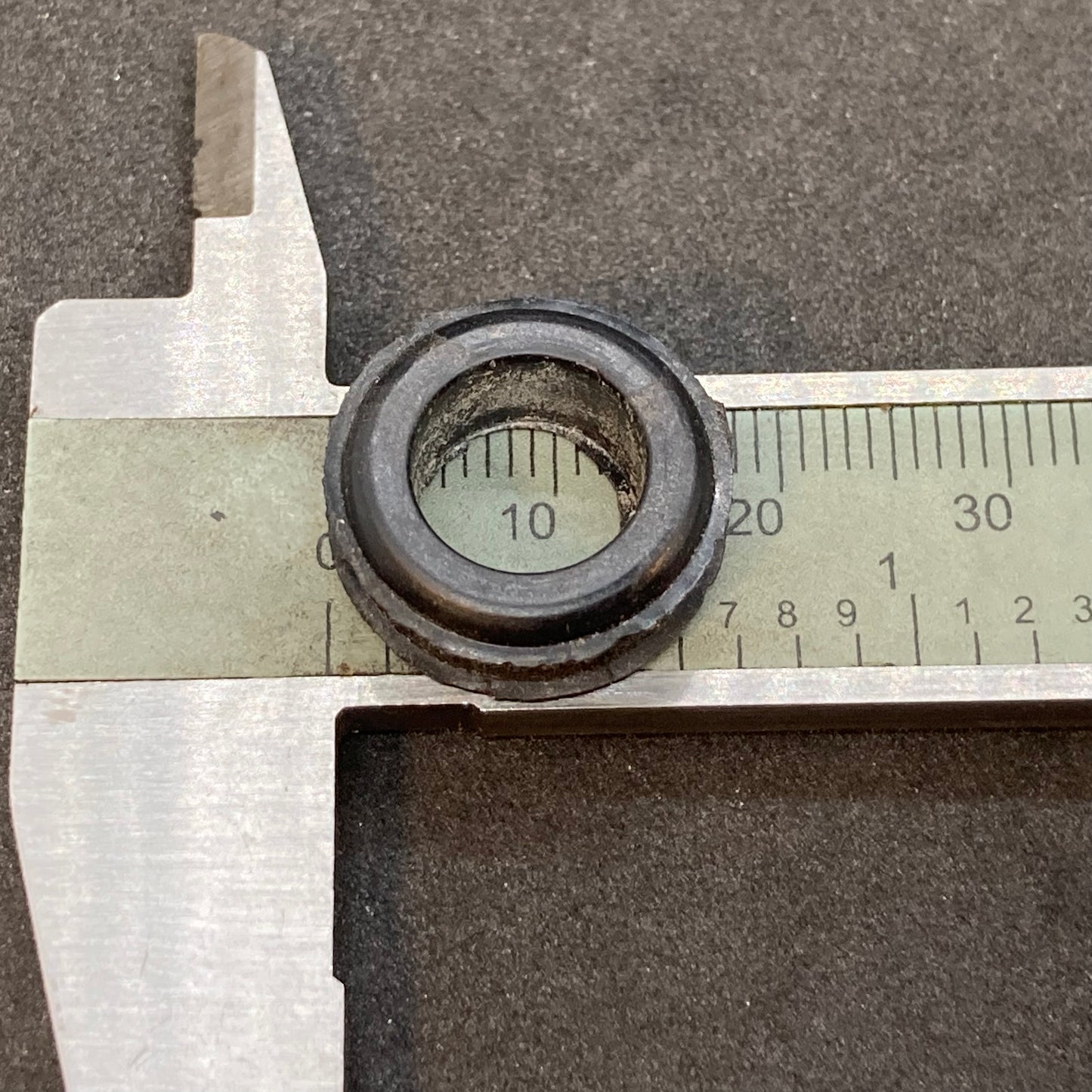 Gasket for steering damper and rear fender lights