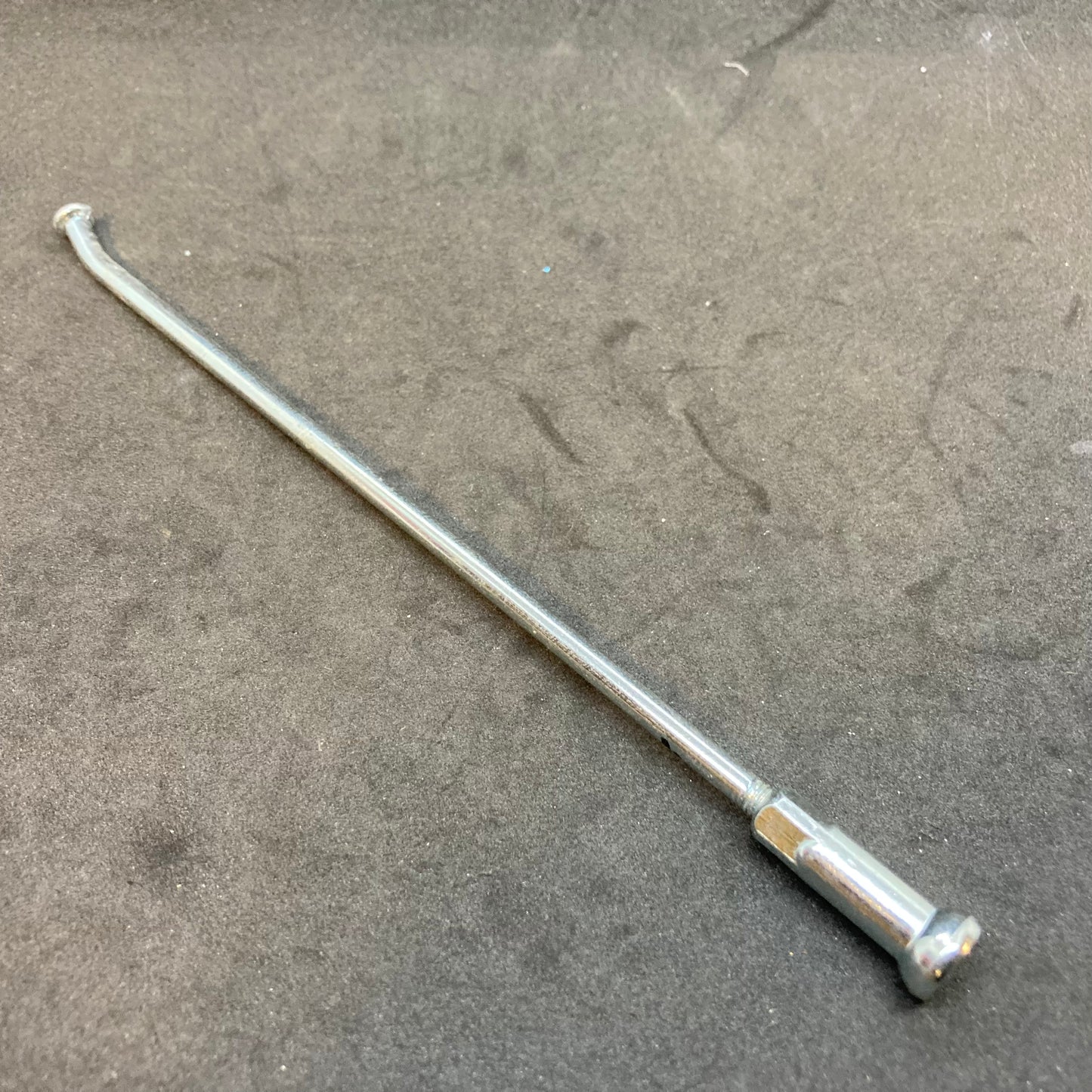 Spoke with nipple for 19" rim with small hub, used
