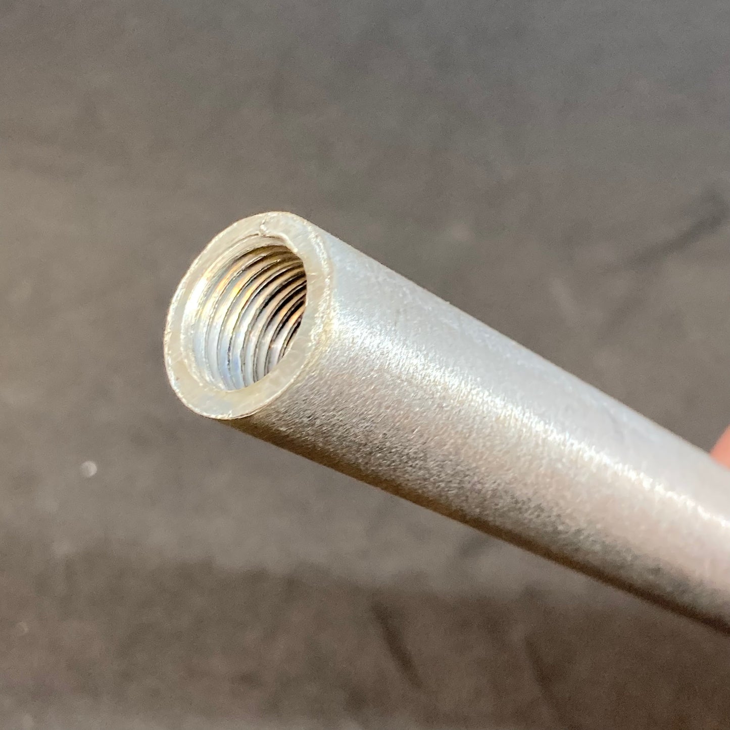 Silent block distance bushing for sidecar swingarm