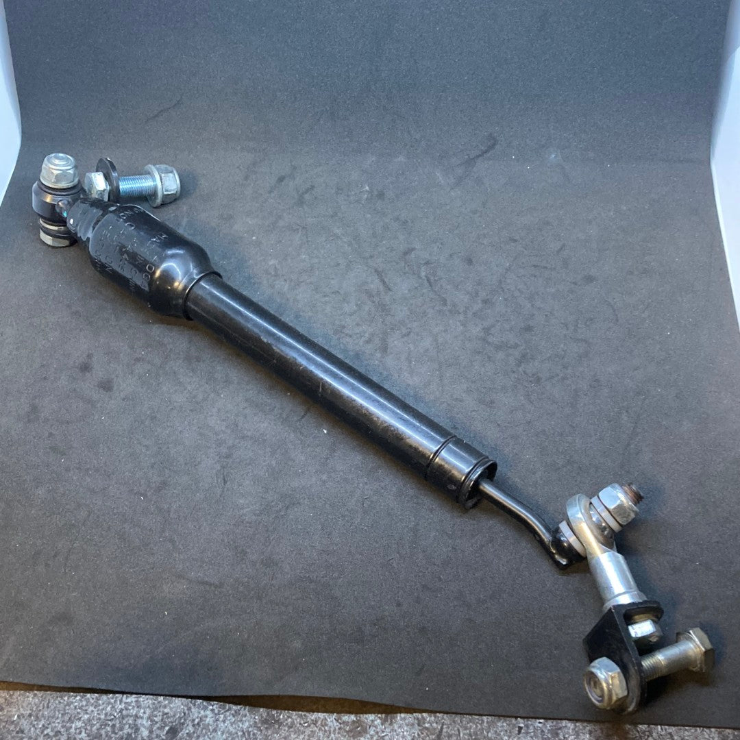 Used steering damper (automotive strut-style)