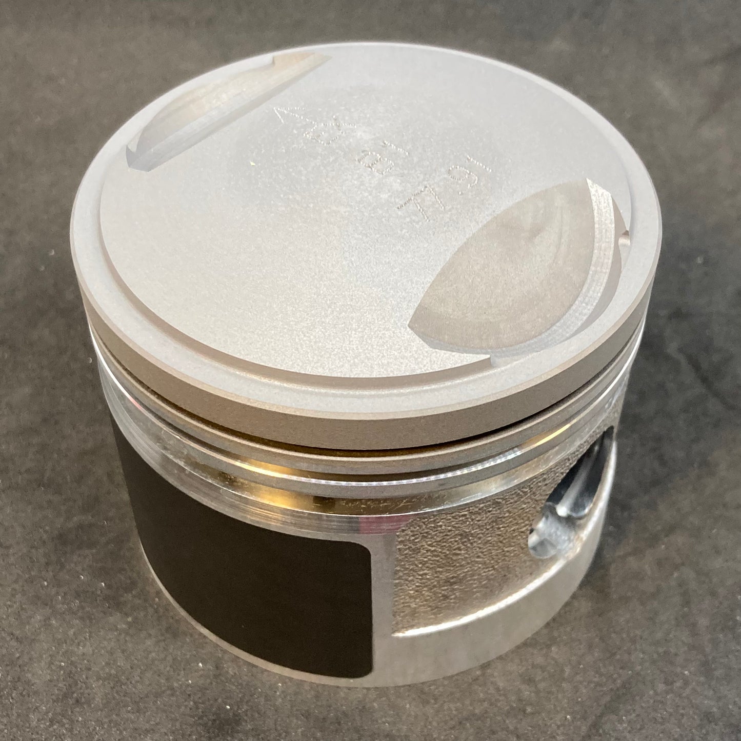 Piston with piston pin and retaining rings