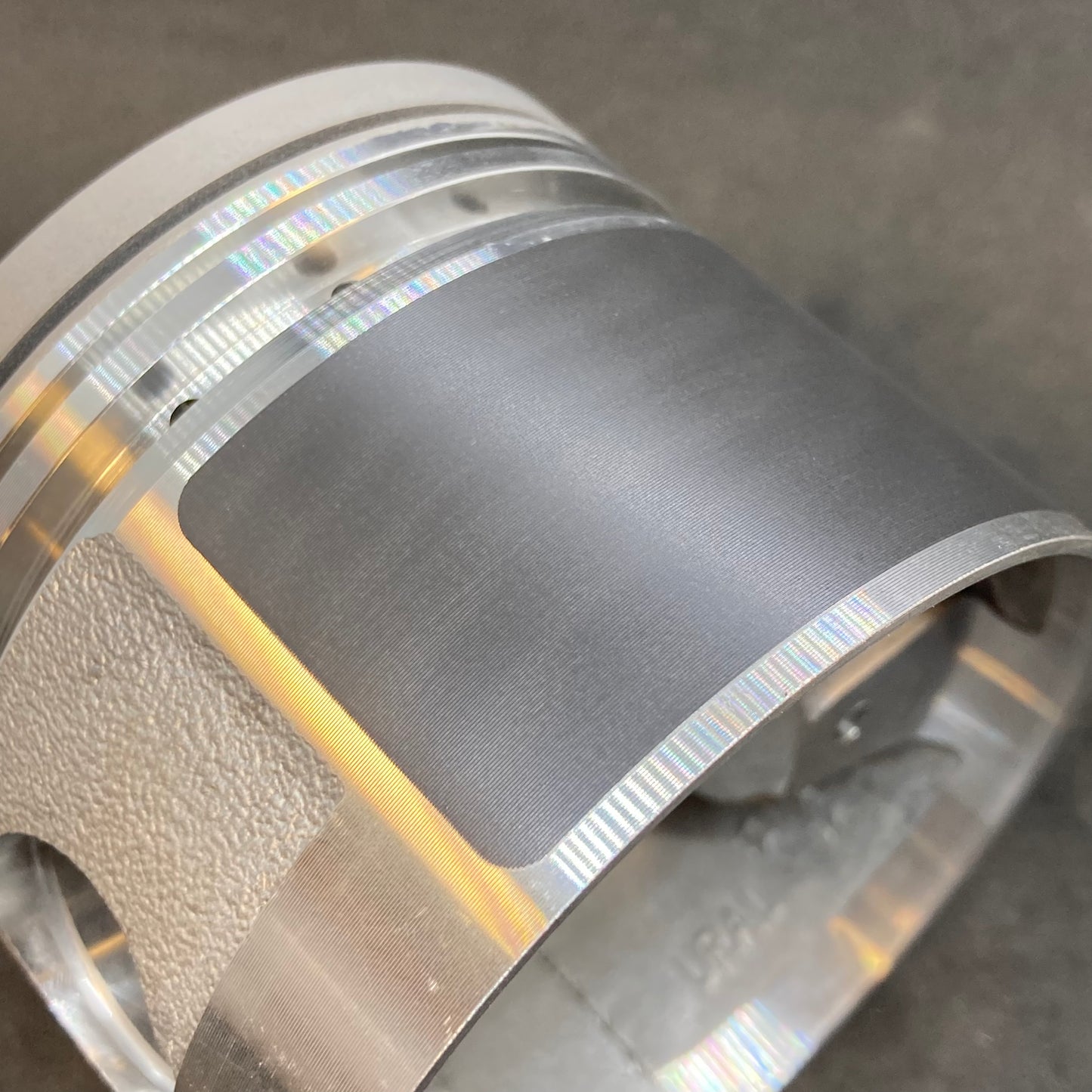 Piston with piston pin and retaining rings