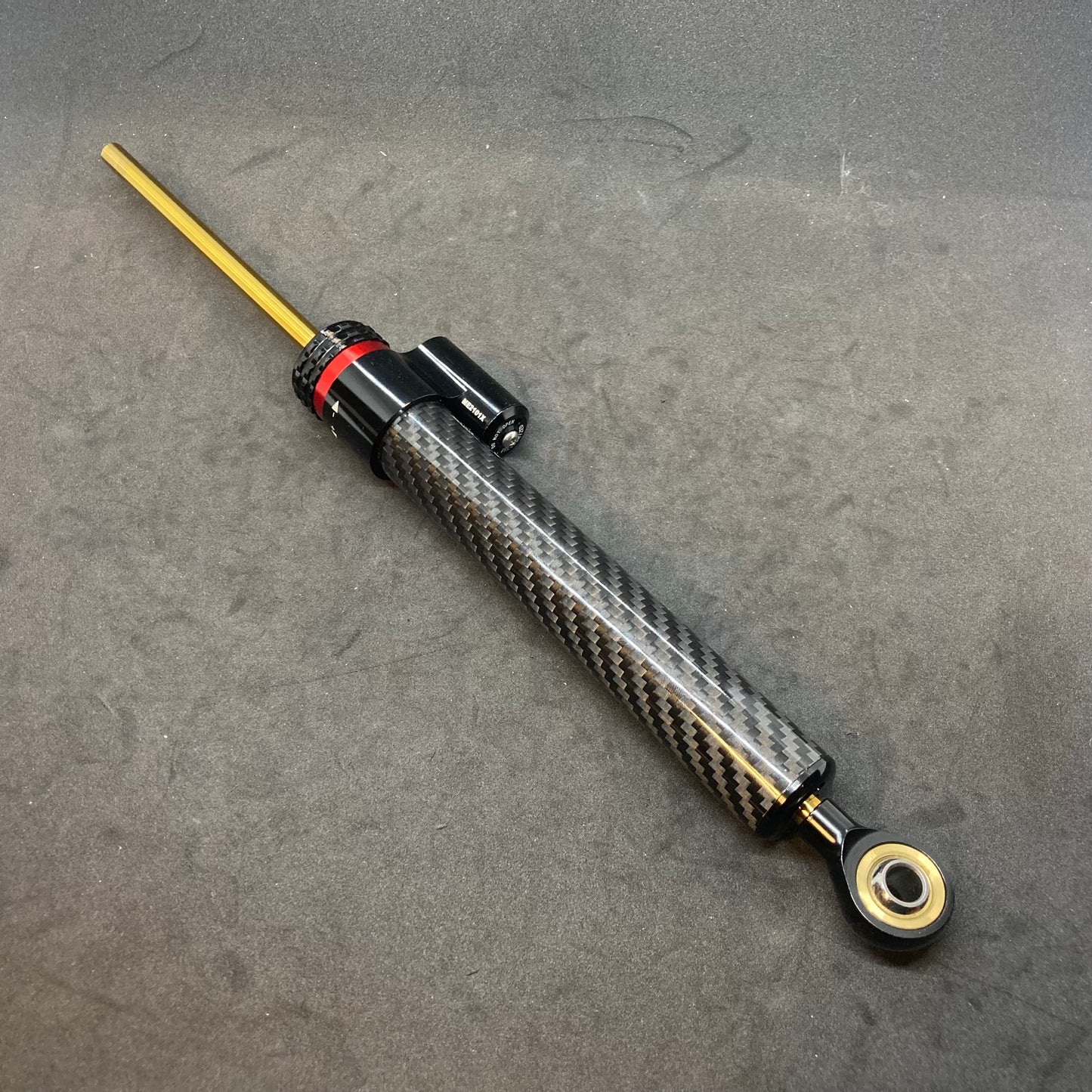 Steering damper (aftermarket, 2014+)