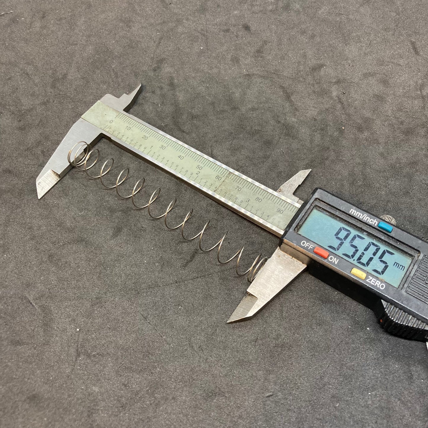 Vacuum piston return spring