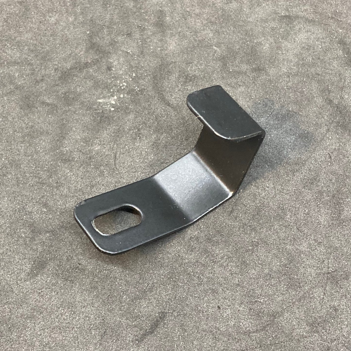 Rear brake hose/cable clamp