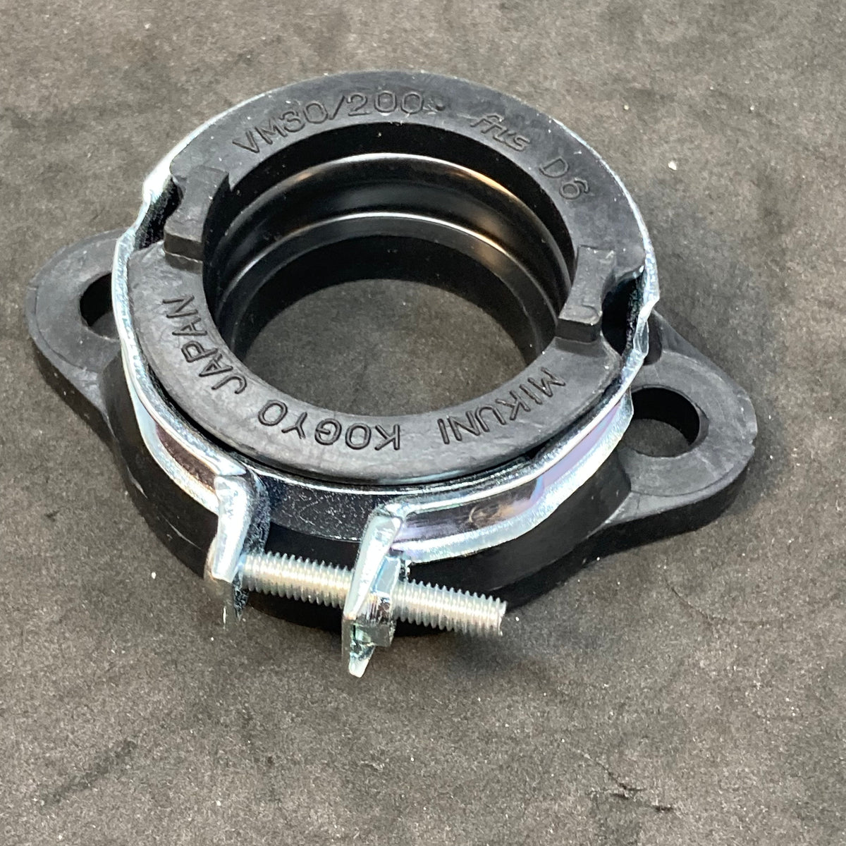 Alternative compliance flange through 2013 (carb holder)