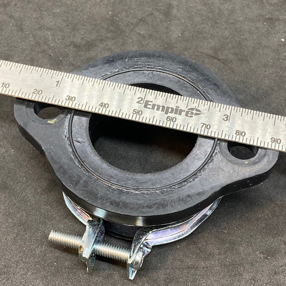 Alternative compliance flange through 2013 (carb holder)